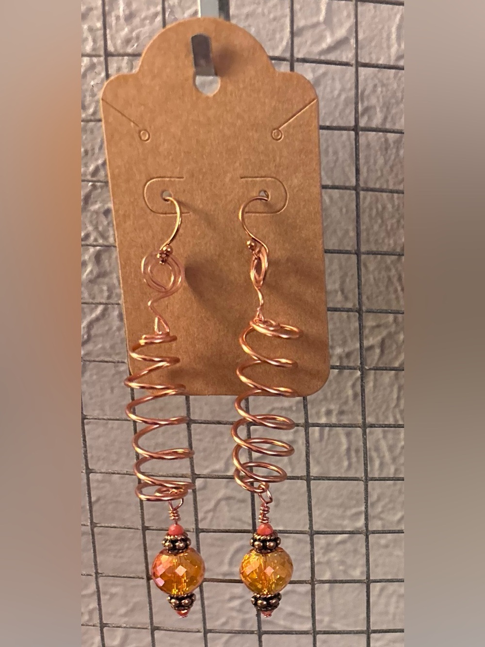 Spiral Copper Drop Earrings with orange Bead Accents